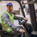 man_working_warehouse_driving_forklift_1303_26619